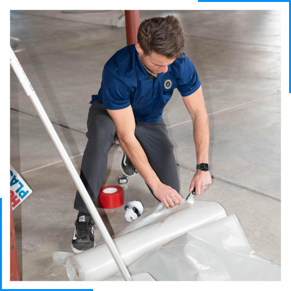 technician cutting plastic