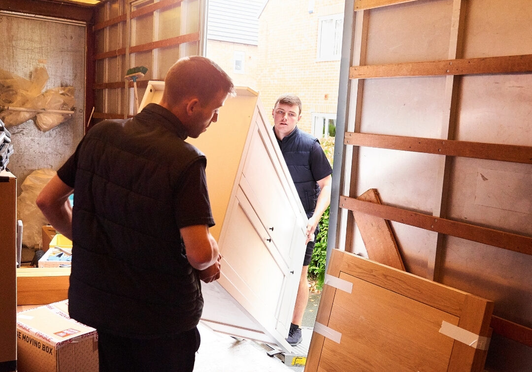 moving furniture into truck