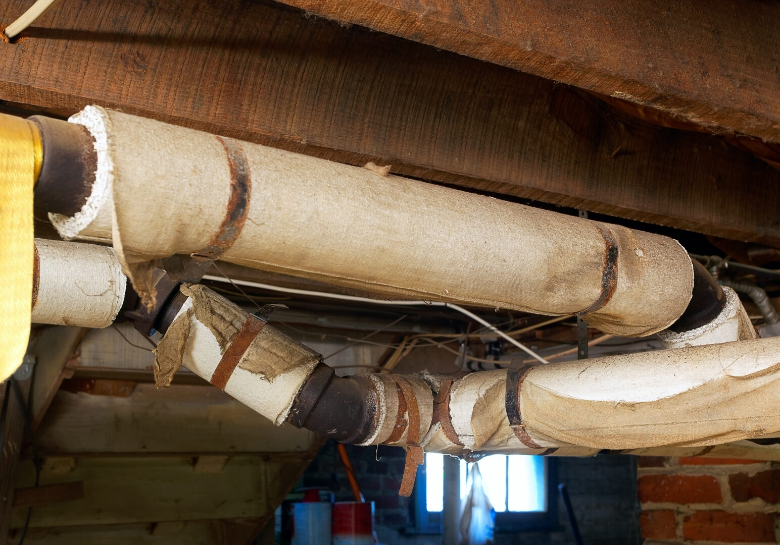 Asbestos pipe wrapping